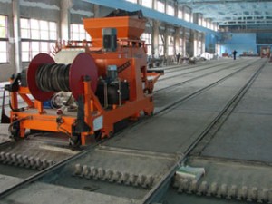 Extendedora del cable de pretensado en la bancada. Fuente: www.resimart.com